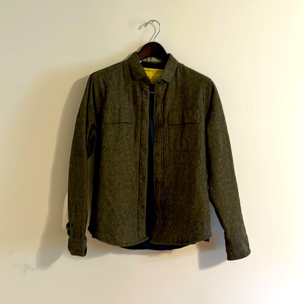 This is 1 of 101 pieces that were made. It says size large, but I always wear S.